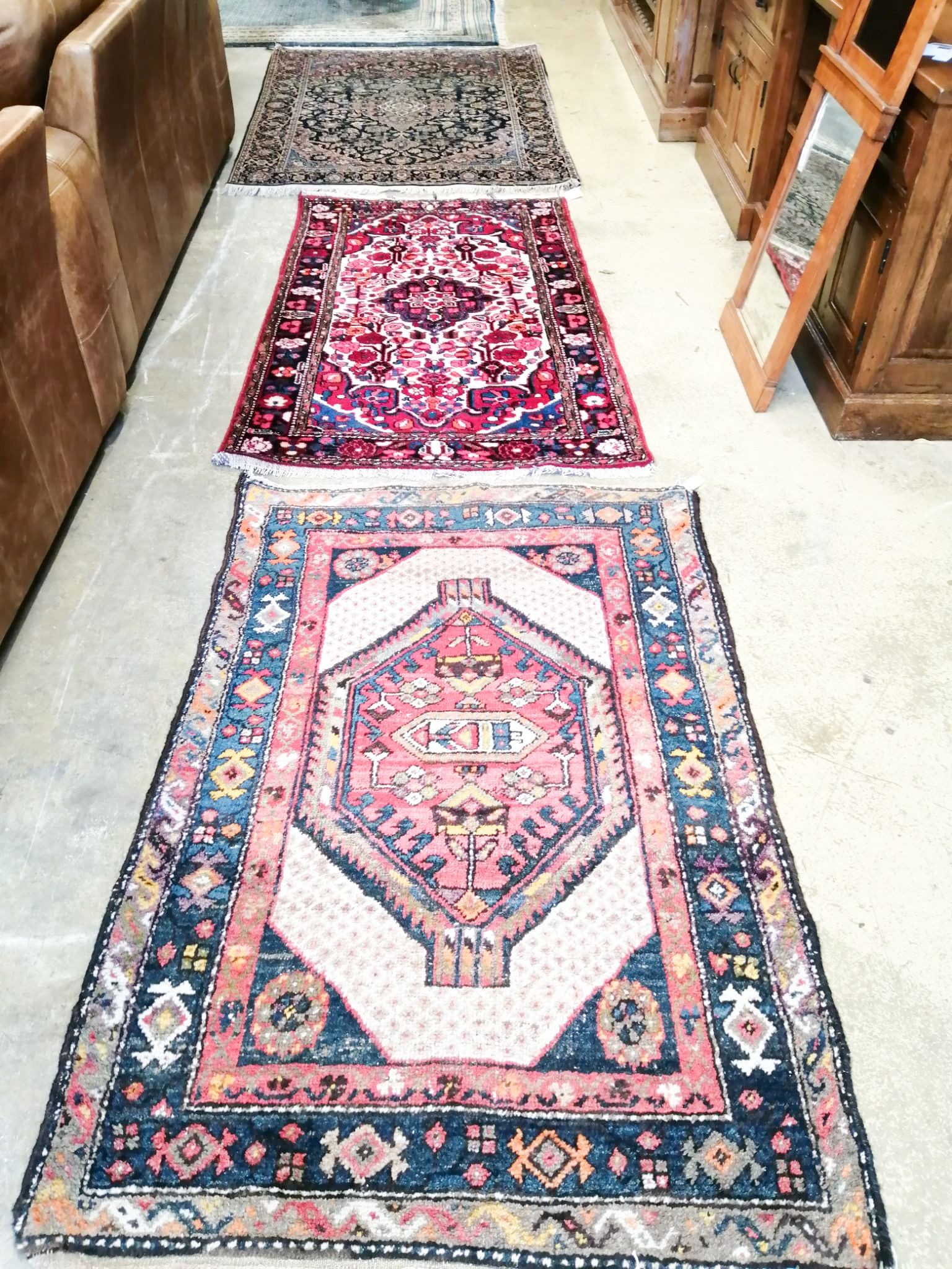 095Two Oriental rugs and another Eastern rug, largest 204 x 140cm